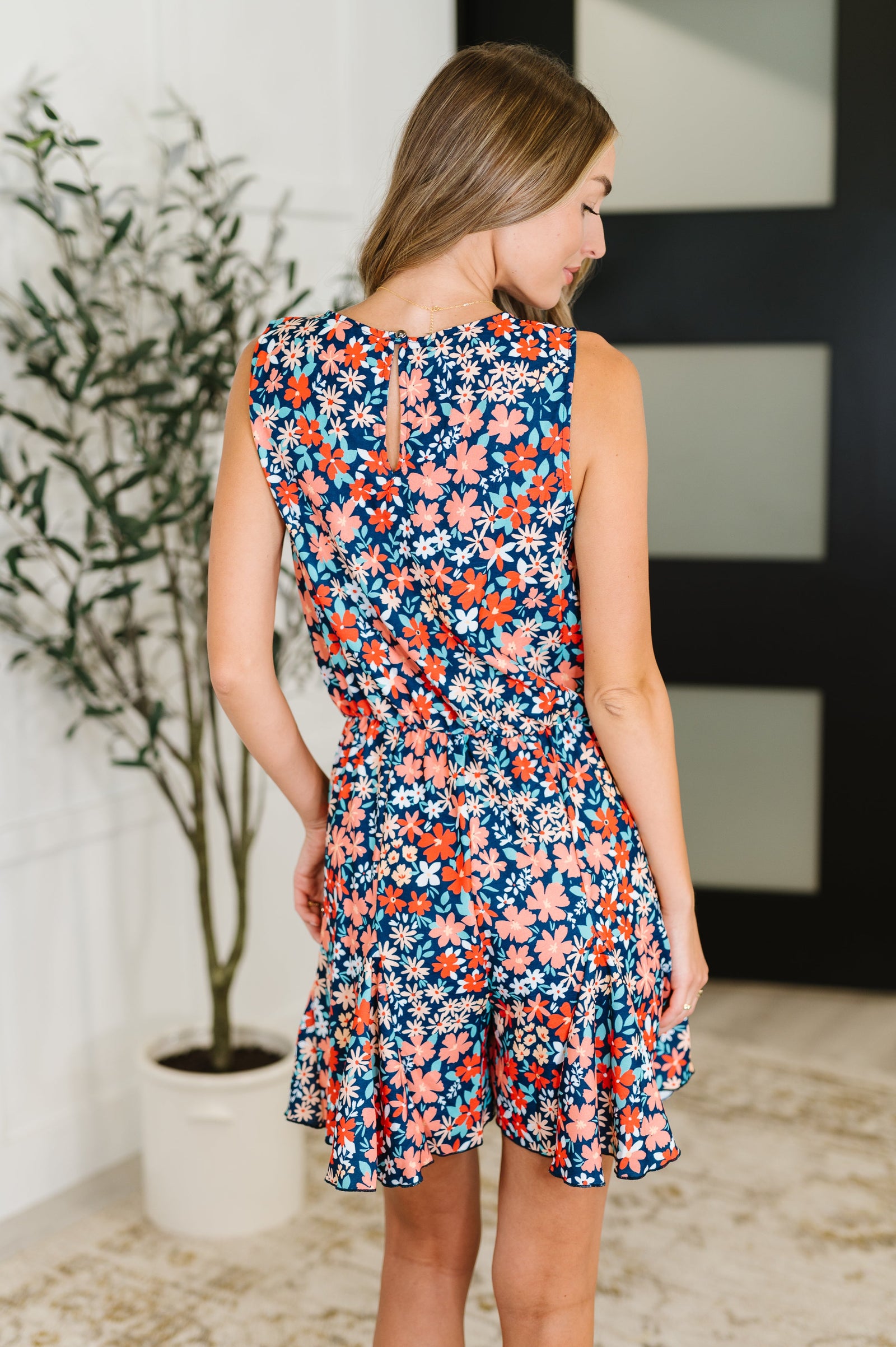 Meadow Mischief Sleeveless Romper in Navy/Orange/Teal