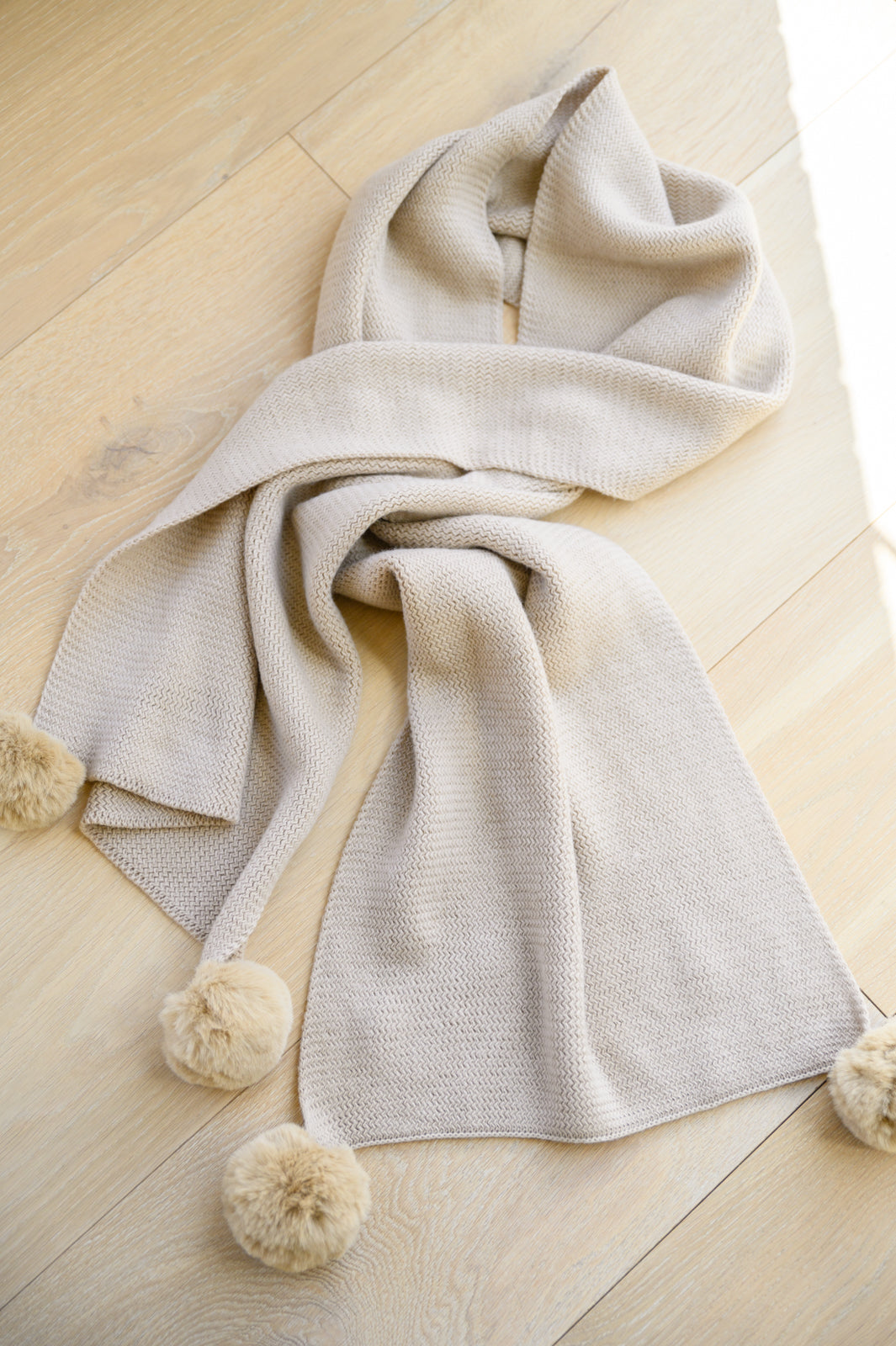 Knitted Fuzzy Pom Pom Scarf In Beige Womens 