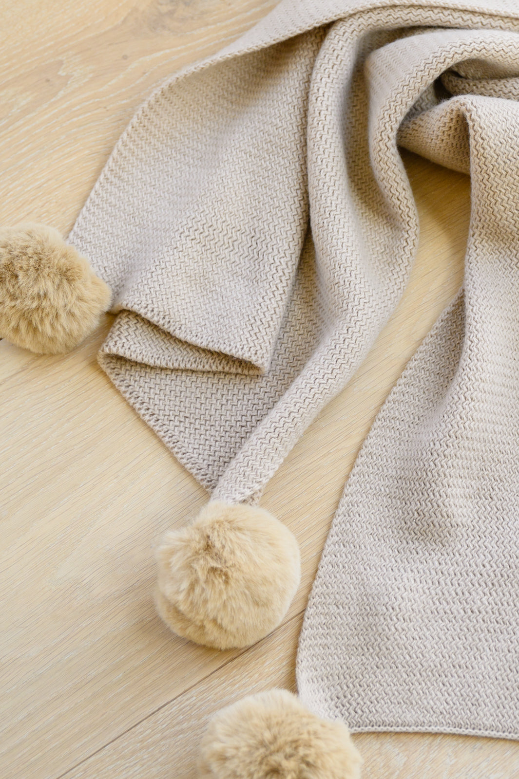 Knitted Fuzzy Pom Pom Scarf In Beige Womens 