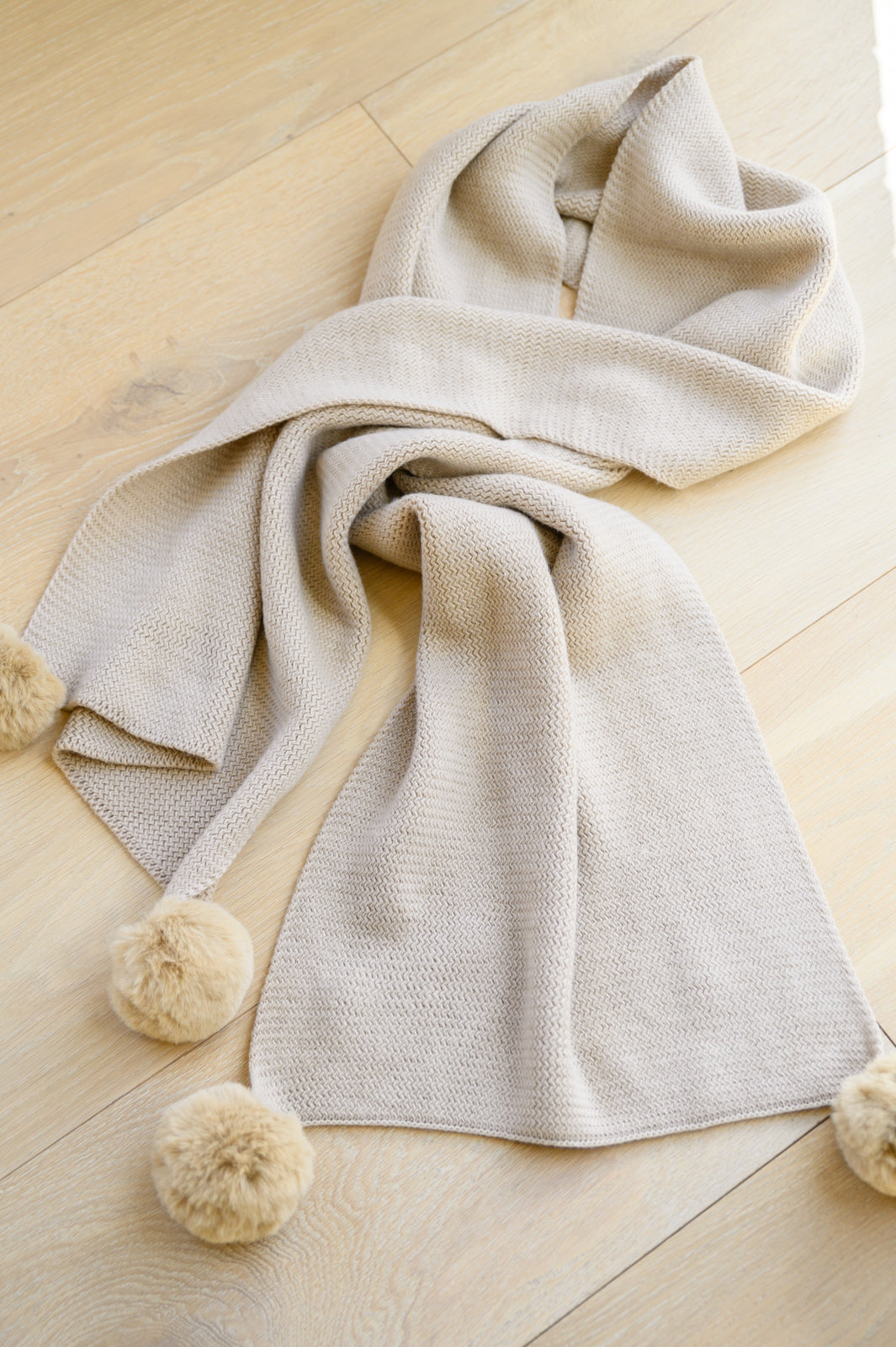 Knitted Fuzzy Pom Pom Scarf In Beige Womens 